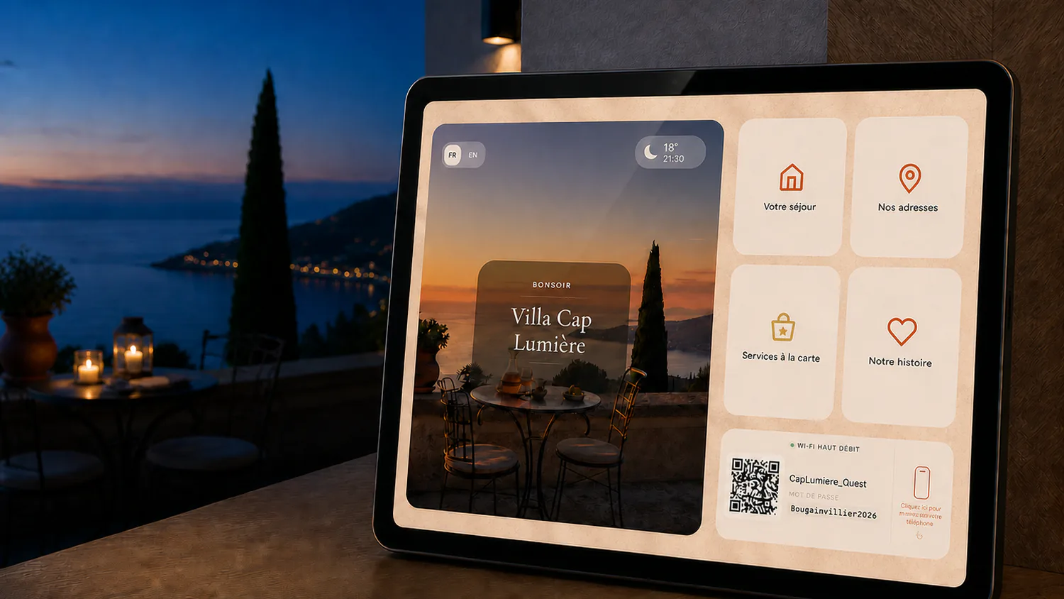 Guide d'accueil numérique ByOhana sur iPad, dans une villa face à la mer, le soir
